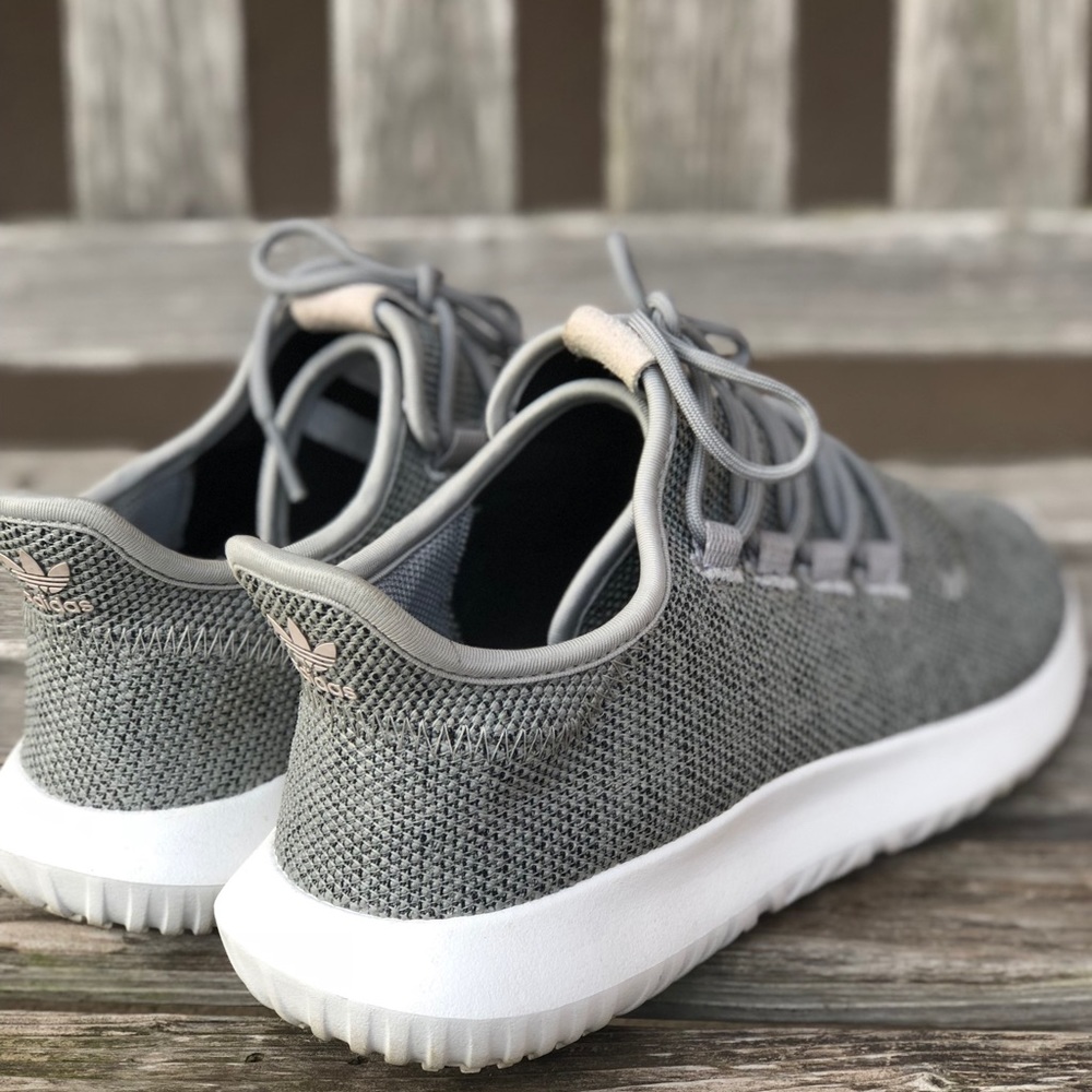White and grey Adidas Tubulars